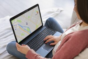 high angle woman holding laptop